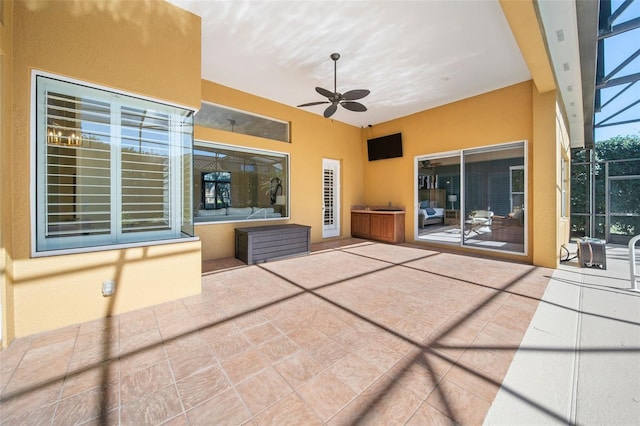 view of patio with ceiling fan