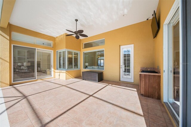 view of patio with ceiling fan