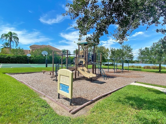 view of play area featuring a yard and basketball court