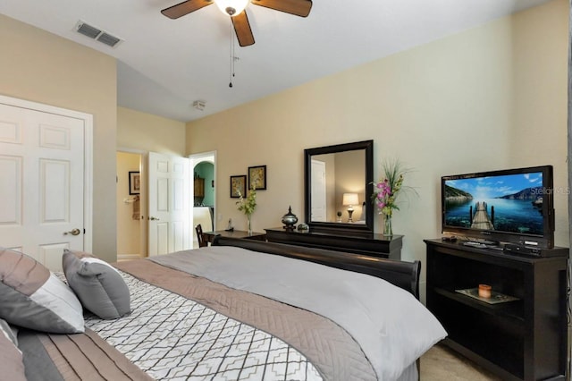 carpeted bedroom with ceiling fan