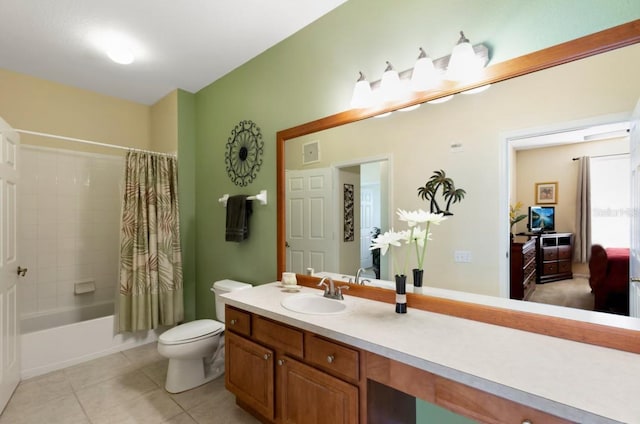 full bathroom featuring tile patterned floors, vanity, toilet, and shower / bath combo with shower curtain