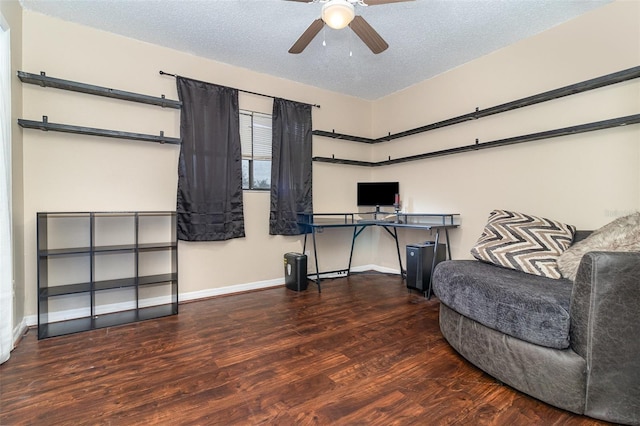 office with a textured ceiling, ceiling fan, and wood-type flooring