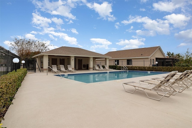 view of pool featuring a patio