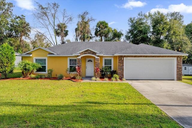 ranch-style home with a front lawn and a garage