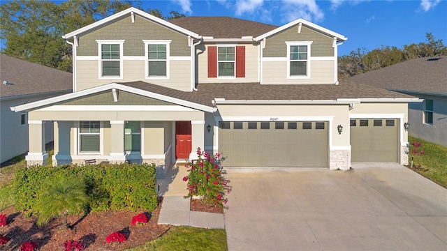 view of front of property featuring a garage