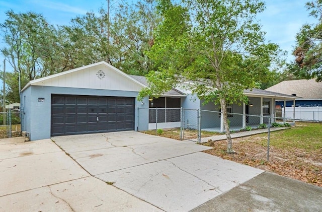 single story home featuring a garage