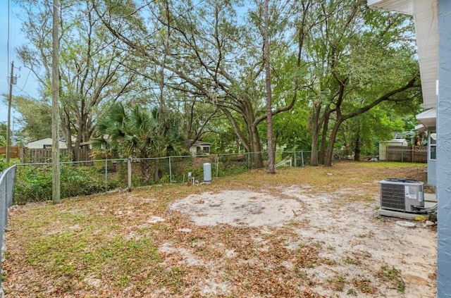 view of yard with central AC unit