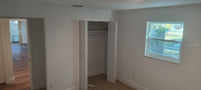 unfurnished bedroom featuring a closet