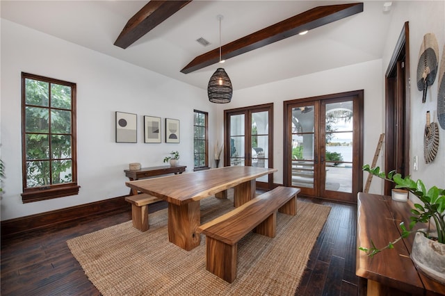 dining room with french doors, dark hardwood / wood-style flooring, and beam ceiling