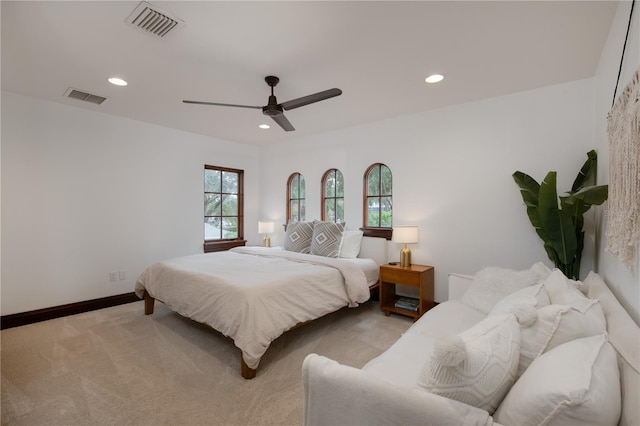 carpeted bedroom with ceiling fan