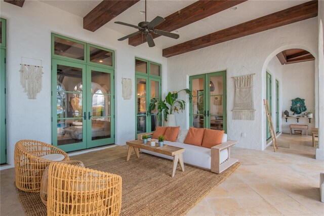 view of patio / terrace with outdoor lounge area, ceiling fan, and french doors