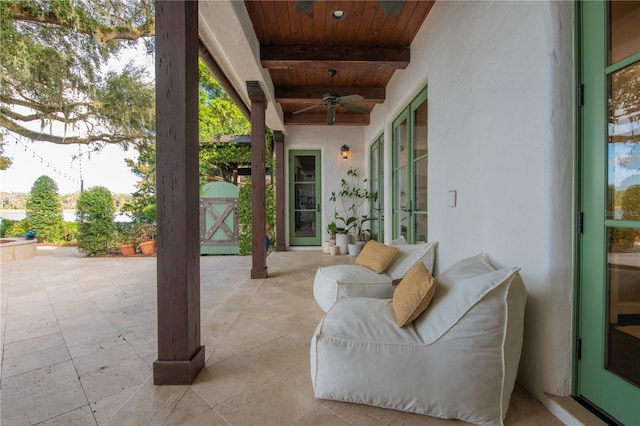 view of patio / terrace featuring ceiling fan