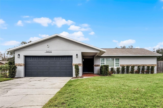 single story home with a front lawn and a garage