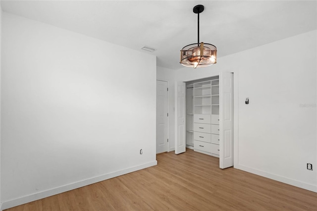 unfurnished bedroom with light hardwood / wood-style flooring