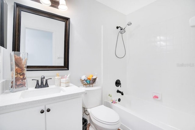 full bathroom featuring vanity, toilet, and tiled shower / bath