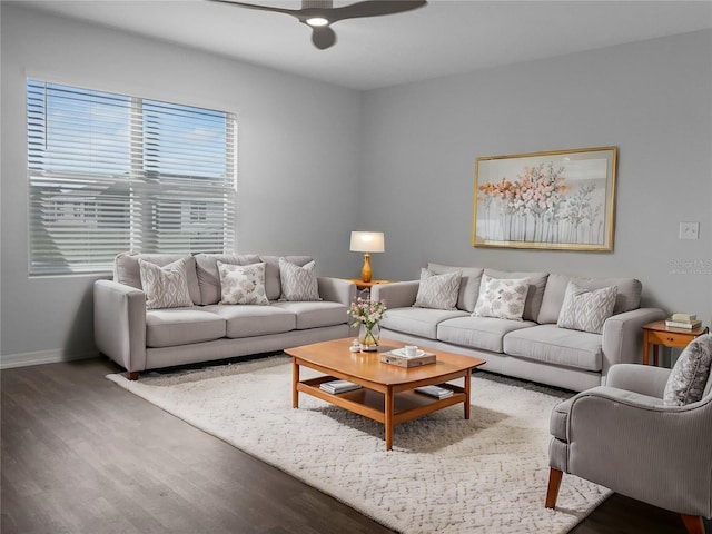 living room with hardwood / wood-style floors and ceiling fan