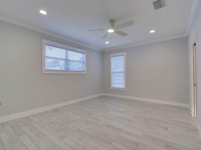 unfurnished room with ceiling fan, light hardwood / wood-style floors, and ornamental molding