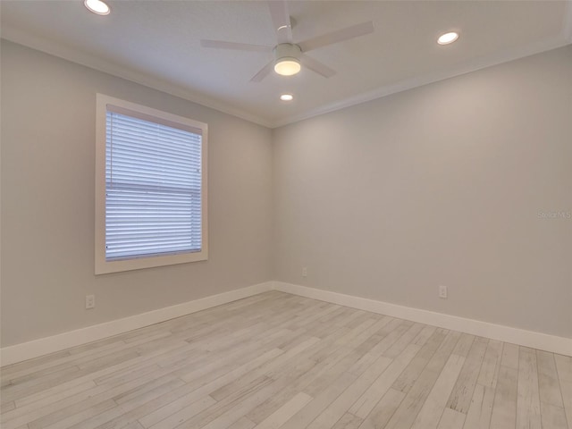 empty room featuring light wood-type flooring, ceiling fan, and ornamental molding