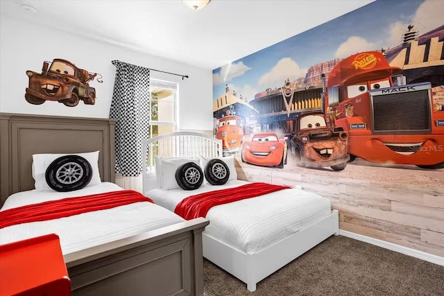 bedroom featuring dark carpet and wood walls