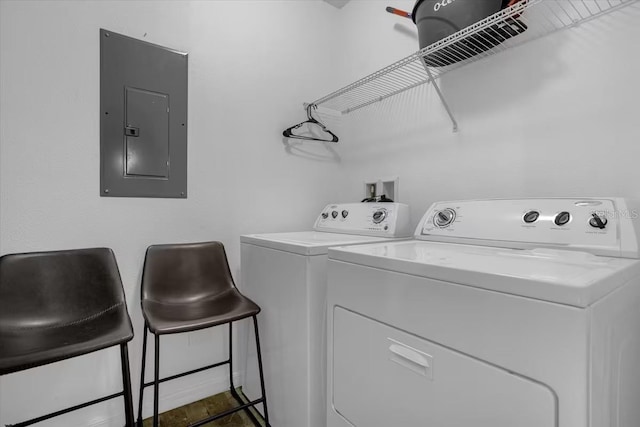 laundry area featuring washing machine and dryer and electric panel