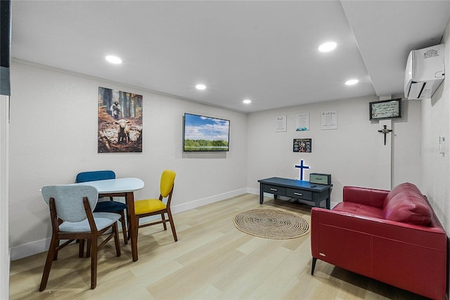 interior space with wood-type flooring and an AC wall unit