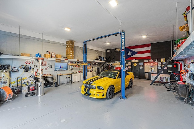 garage with a workshop area