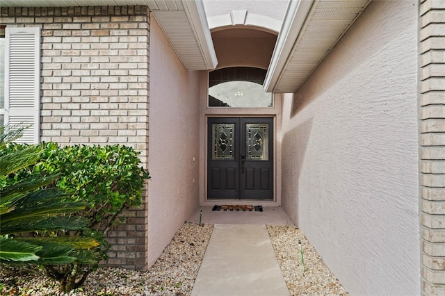 doorway to property with french doors