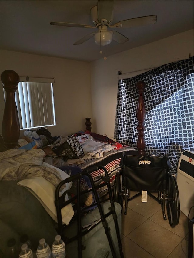 bedroom with tile patterned floors and ceiling fan