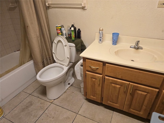 full bathroom featuring shower / bath combo, vanity, toilet, and tile patterned floors