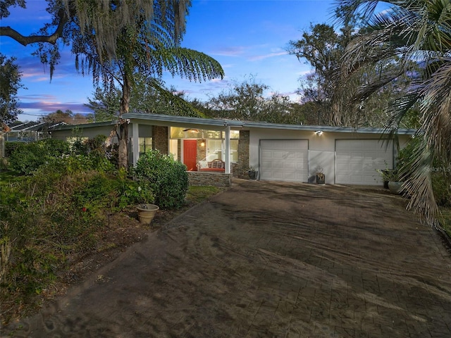 ranch-style house with a garage