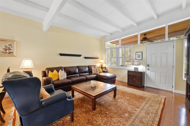 living room with beamed ceiling, ceiling fan, and hardwood / wood-style floors