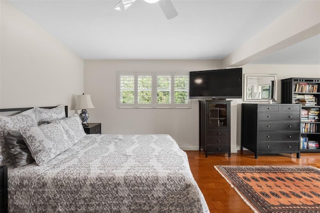 bedroom featuring ceiling fan and dark hardwood / wood-style floors