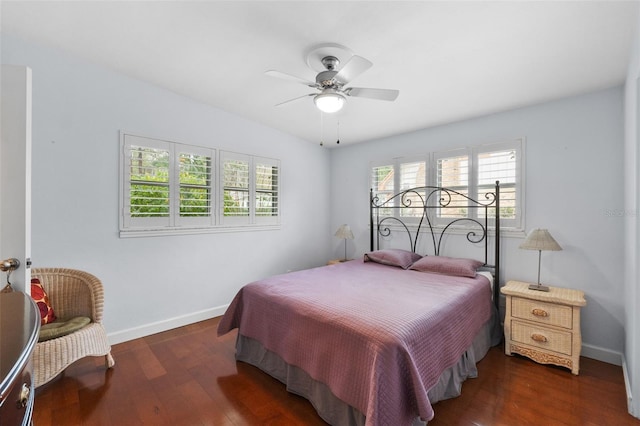 bedroom featuring ceiling fan and dark hardwood / wood-style flooring