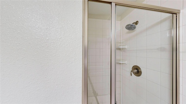 room details with an enclosed shower