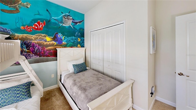 carpeted bedroom with a closet