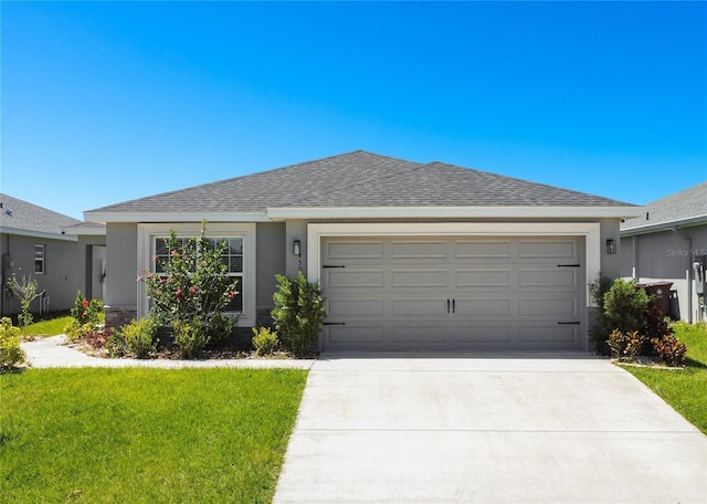 ranch-style house with a garage and a front lawn