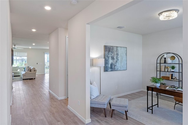 office with baseboards, visible vents, a ceiling fan, light wood-style floors, and recessed lighting