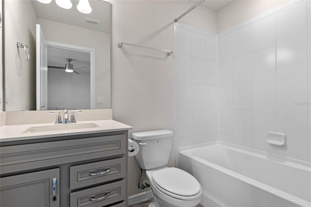 full bathroom featuring toilet, visible vents, shower / bathing tub combination, and vanity