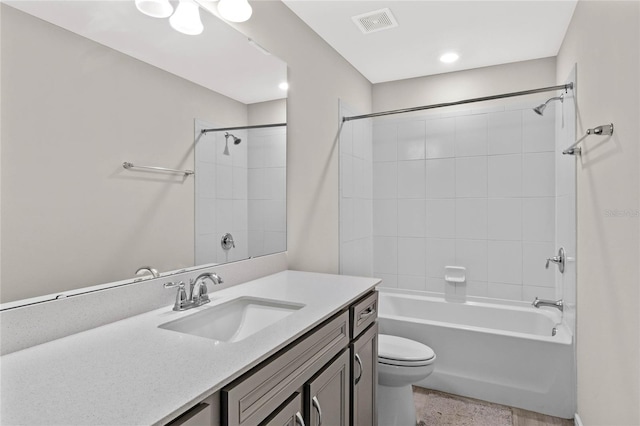 bathroom with toilet, bathing tub / shower combination, visible vents, and vanity