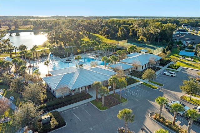 birds eye view of property featuring a water view