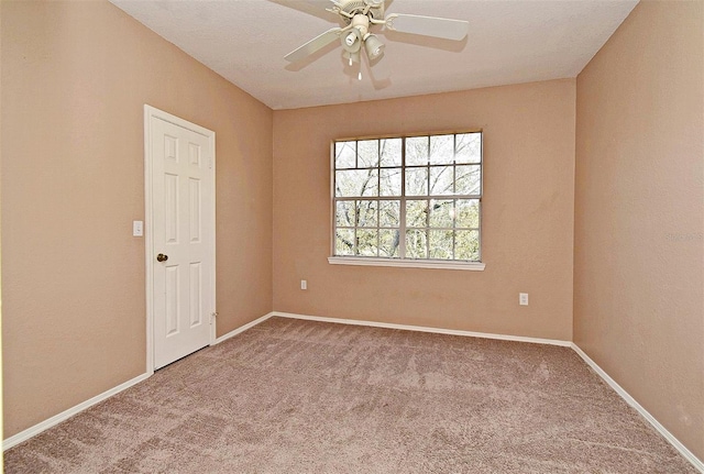 2572 Robert Trent Jones Dr Unit 1231, Orlando, FL 32835 - carpeted spare room featuring baseboards and a ceiling fan