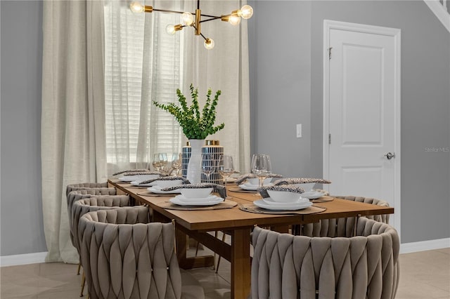 dining room with a chandelier