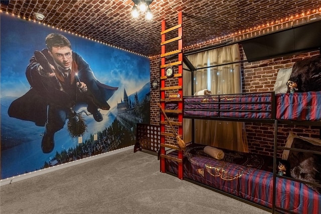 carpeted bedroom featuring vaulted ceiling and brick ceiling