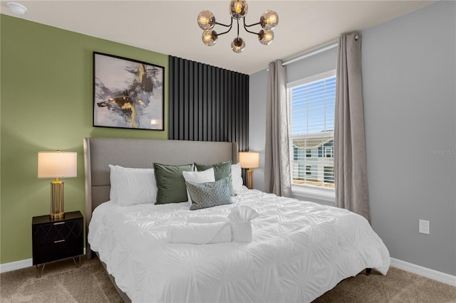 bedroom featuring carpet and an inviting chandelier