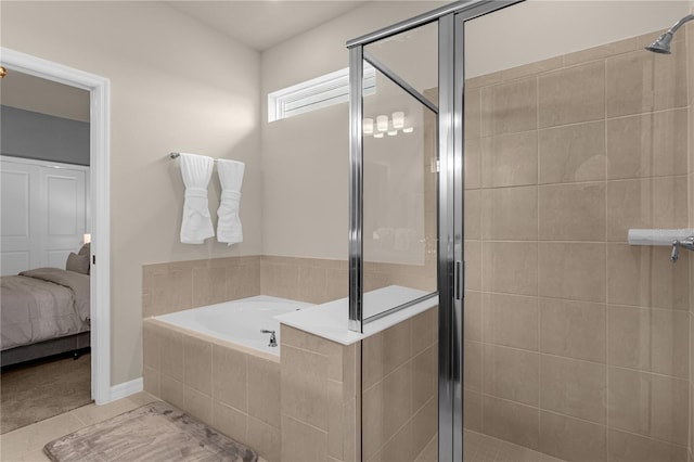 bathroom featuring tile patterned floors and plus walk in shower