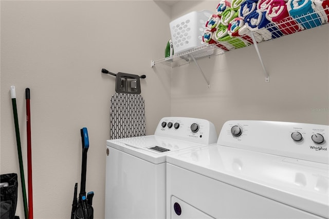 washroom with washer and clothes dryer