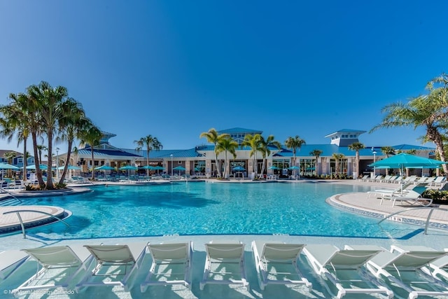 view of swimming pool with a patio