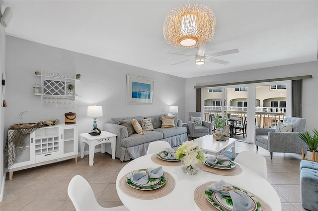 tiled living room featuring ceiling fan