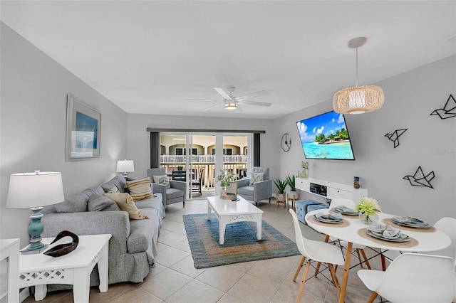 living room with light tile patterned floors and ceiling fan