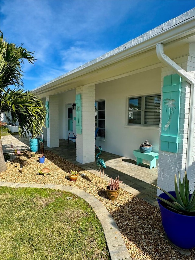 rear view of house with a patio